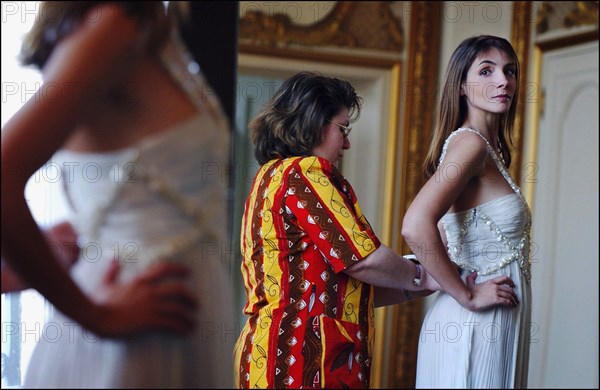 05/00/2003. EXCLUSIVE Clotilde Courau tries gowns on at Valentino's before the 56th Cannes Film