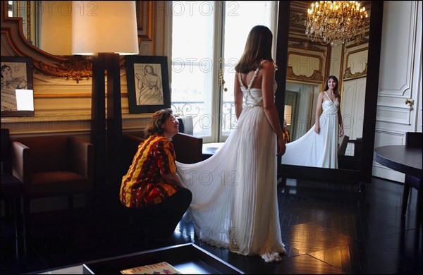 05/00/2003. EXCLUSIVE Clotilde Courau tries gowns on at Valentino's before the 56th Cannes Film