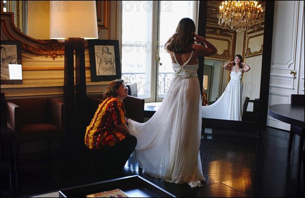 05/00/2003. EXCLUSIVE Clotilde Courau tries gowns on at Valentino's before the 56th Cannes Film