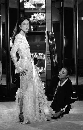 05/00/2003. Elsa Zylberstein tries gowns on at Chanel's before the 56th Cannes Film