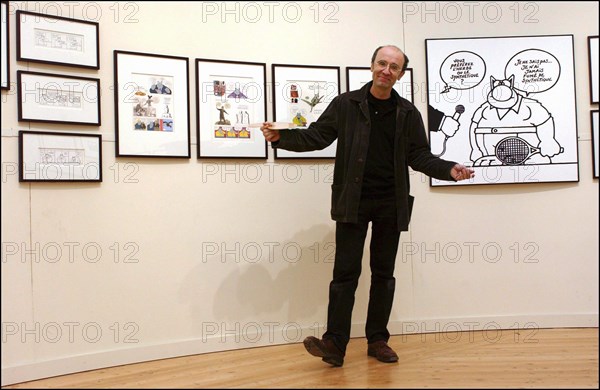 10/24/2003. Belgian cartoonist and TV host Phillipe Geluck's art exhibit at the Beaux-Arts, Paris : a first for any comic strip artist.