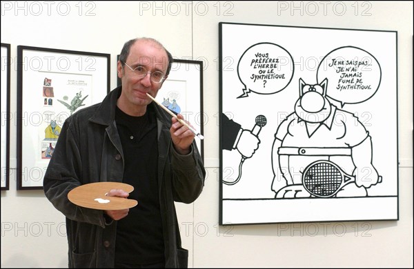 10/24/2003. Belgian cartoonist and TV host Phillipe Geluck's art exhibit at the Beaux-Arts, Paris : a first for any comic strip artist.