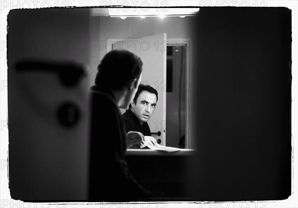 12/00/2003. Nikos Aliagas, host of the Star Academy shows backstage and on stage.