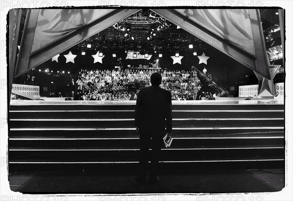 12/00/2003. Nikos Aliagas, host of the Star Academy shows backstage and on stage.