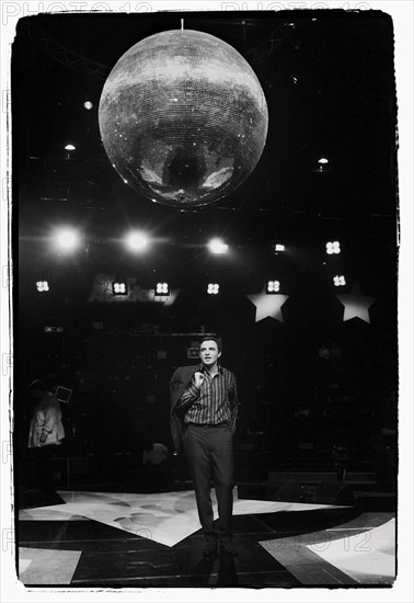 12/00/2003. Nikos Aliagas, host of the Star Academy shows backstage and on stage.