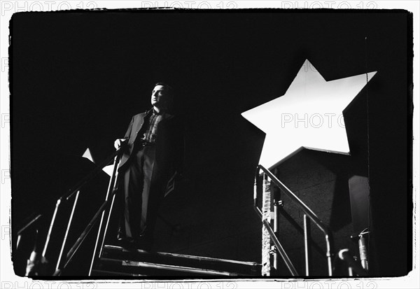 12/00/2003. Nikos Aliagas, host of the Star Academy shows backstage and on stage.