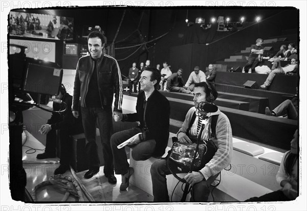 12/00/2003. Nikos Aliagas, host of the Star Academy shows backstage and on stage.