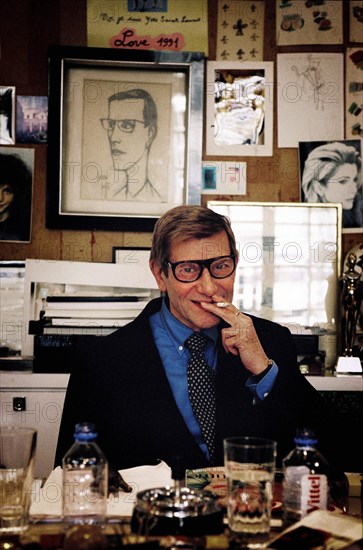 03/00/2004. Legendary fashion designer Yves Saint Laurent opens a museum dedicated to his past work