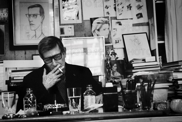 03/00/2004. Legendary fashion designer Yves Saint Laurent opens a museum dedicated to his past work