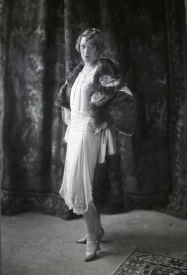 Annette Wills wearing a dress designed by Worth