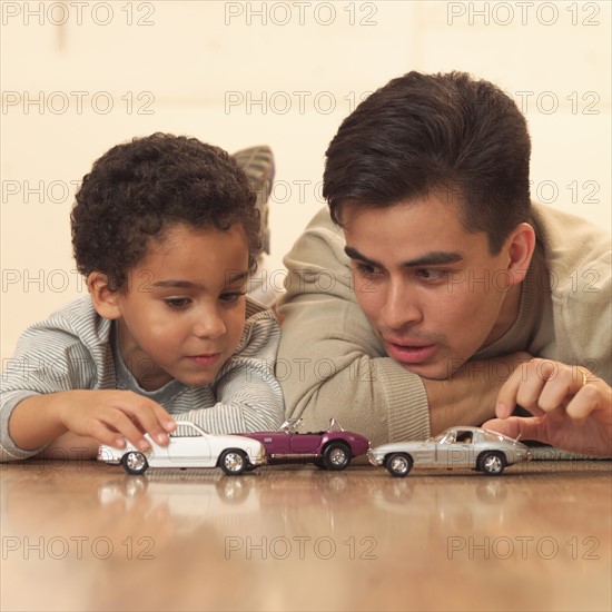 Father and son playing together.