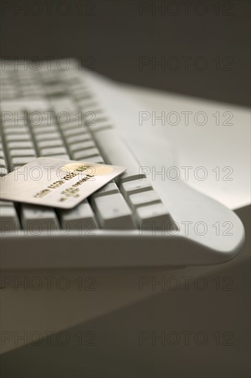 Computer keyboard and credit card.