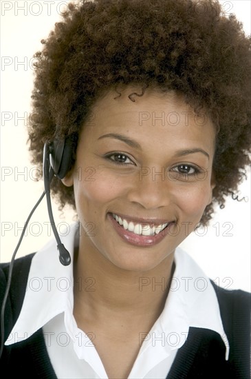 Woman wearing a headset.