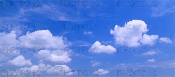 Clouds against a blue sky.