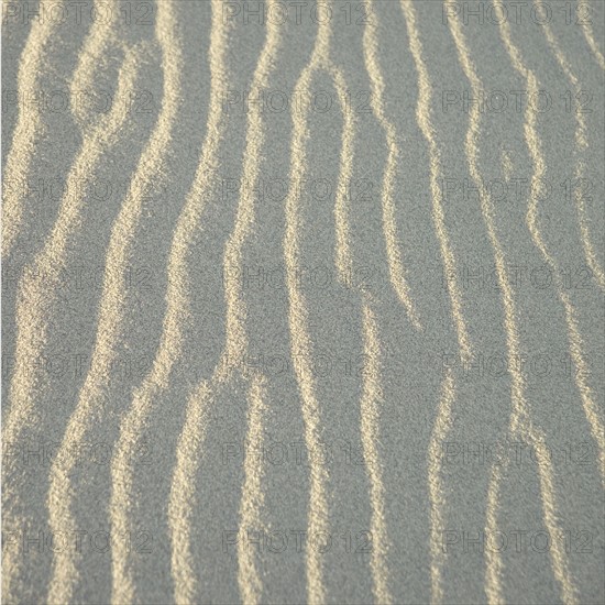 Patterns of wind-blown sand.