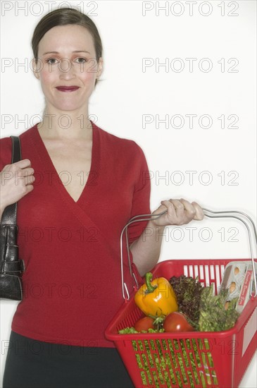 Woman with grocery basket.
