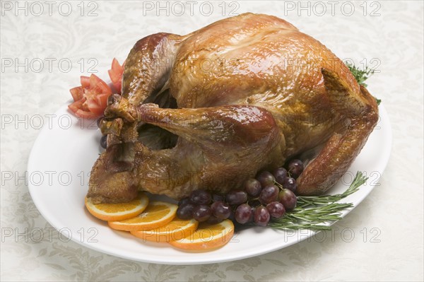 A roast turkey ready for eating.