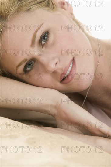 Tight headshot of blond woman.