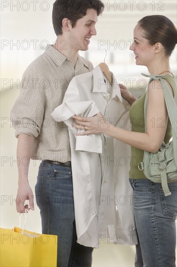 Young couple with men's shirt.