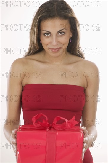 Woman holding a gift.