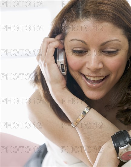 Woman talking on mobile phone.