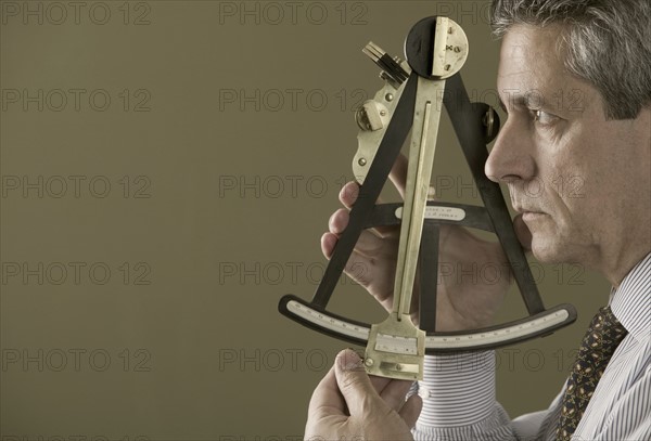 Man with octant.