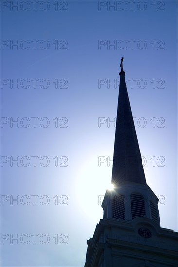 Silhouette of a church steeple.