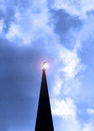 Silhouette of church steeple.