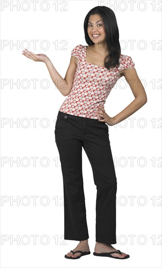 A woman gesturing with her hand.