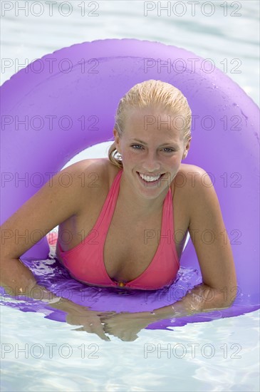 Young woman in a swimming pool.