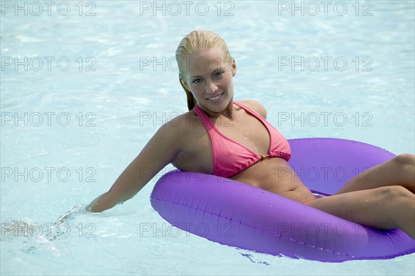Young woman in a swimming pool.