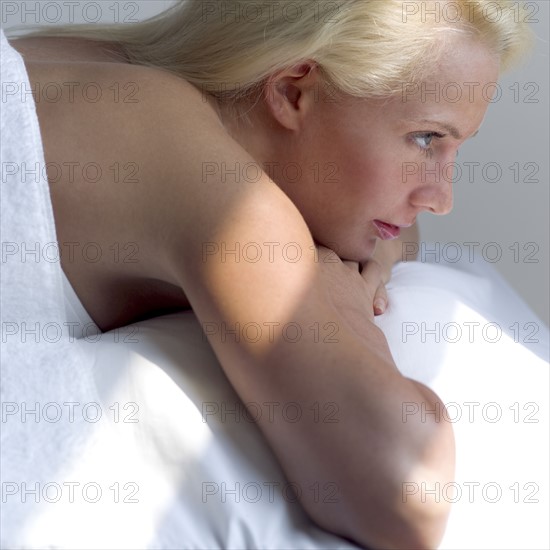 Woman relaxing on a masseuse table.