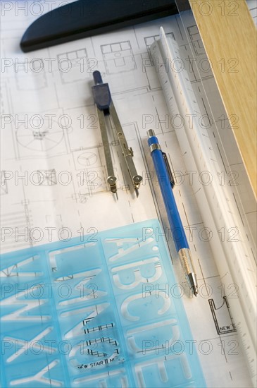 Architectural tools and blue prints.