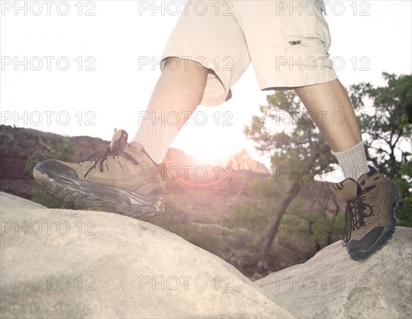 Closeup of feet hiking.