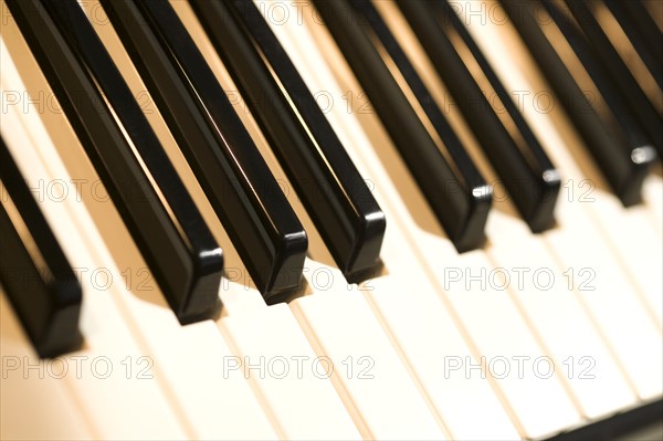 Closeup of piano keys.