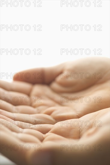 Close up of cupped hands.