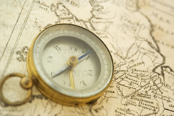 Closeup of a map and compass.