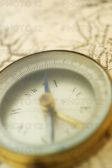 Closeup of a map and compass.