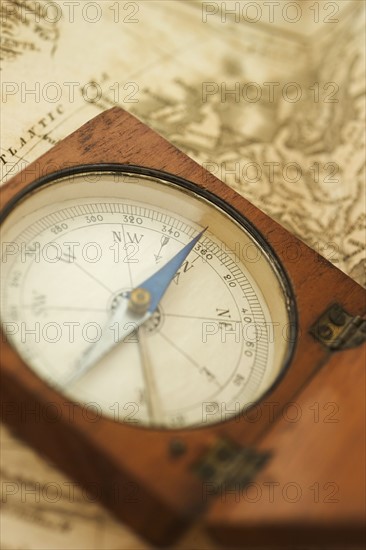 Closeup of a map and compass.