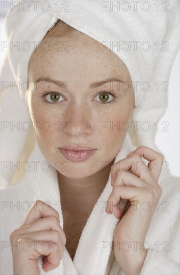 Woman with towel on head.