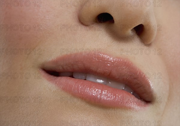 Closeup of parted female lips.