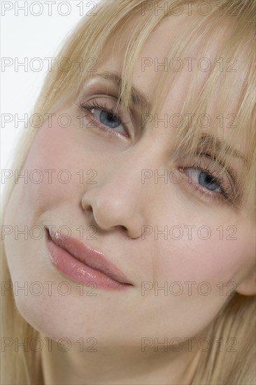 Closeup of tired woman's face.