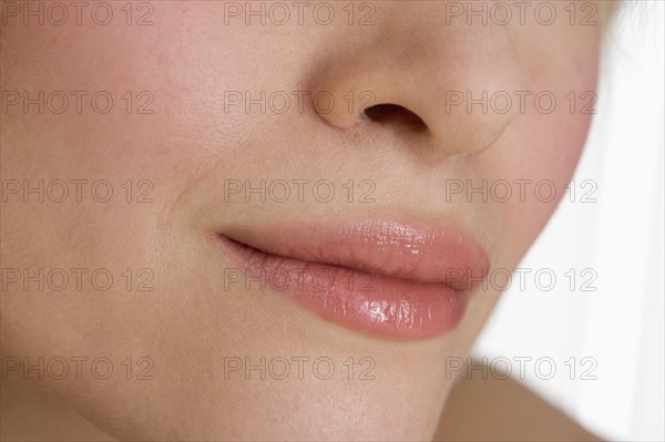 Closeup of woman's mouth.