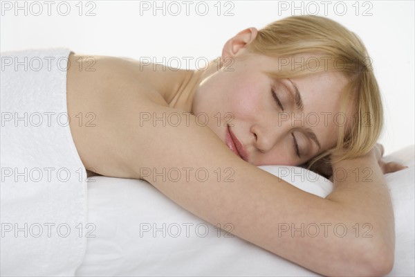 Sleeping woman enjoying restful sleep.