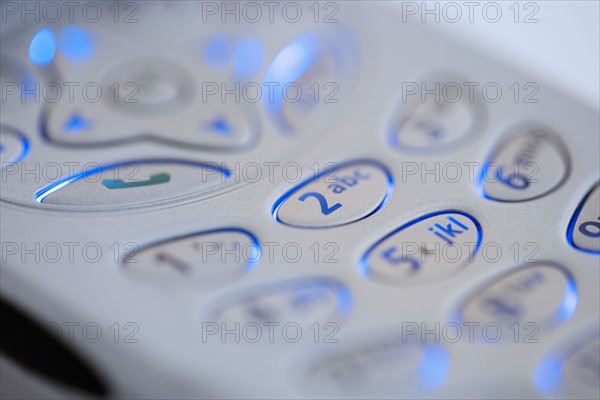 Closeup of mobile phone keypad.