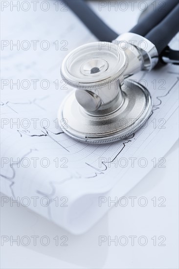 Stethoscope on monitor printout.