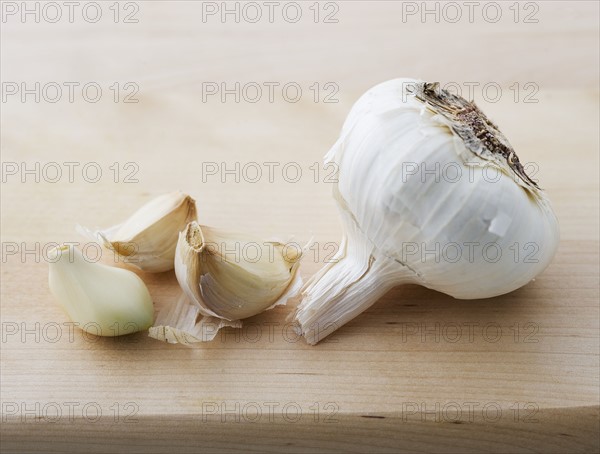 Closeup of garlic head and cloves.