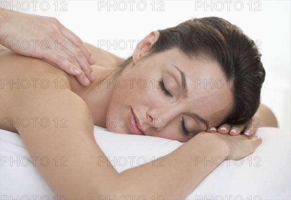 Woman receiving a massage.