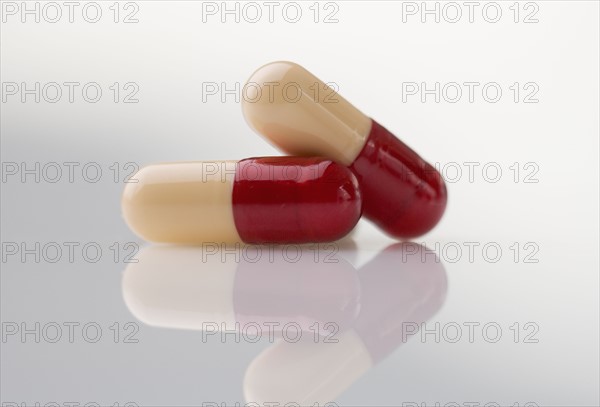 Closeup of capsules with reflection.