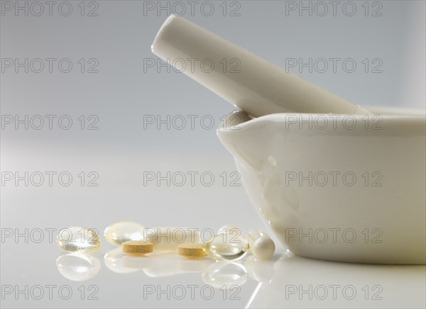 Pills with mortar and pestle.